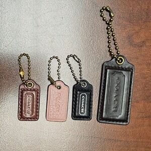 Coach hang tags lot of 4- 1 Large and 3 Mini Black, Brown, Pink & Burgundy